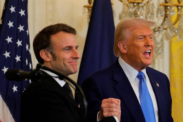 U.S. President Donald Trump and French President Emmanuel Macron attend a press conference at the White House in Washington