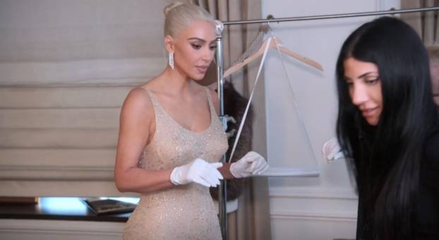 Kim Kardashian freaks out and won’t let anyone touch the iconic Marilyn Monroe dress as she gets ready for the Met Gala