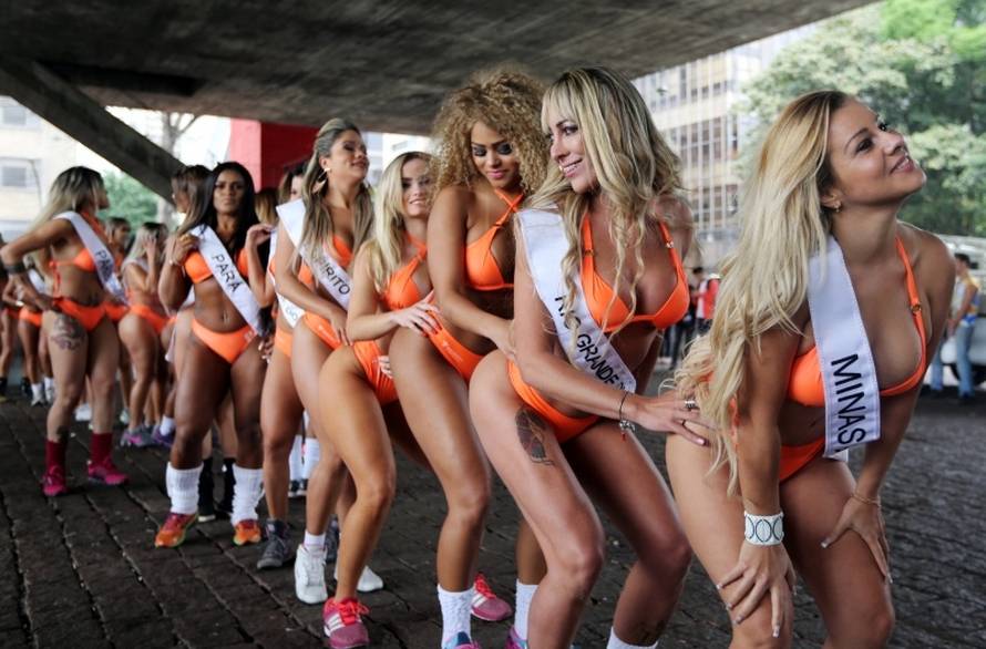 Miss BumBum Brazil 2016 pageant contestants pose at Paulista Avenue in Sao Paulo's financial centre
