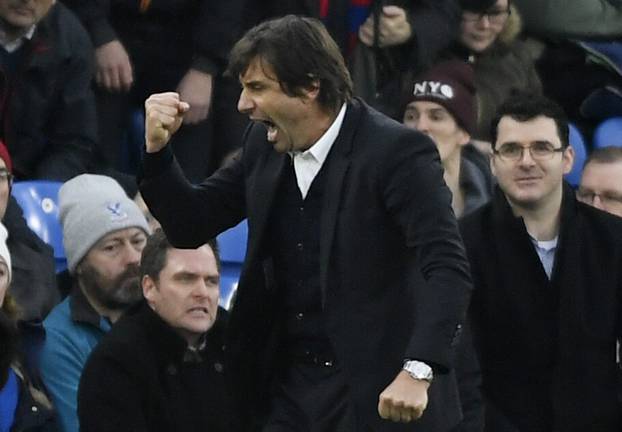 Chelsea manager Antonio Conte celebrates after the game