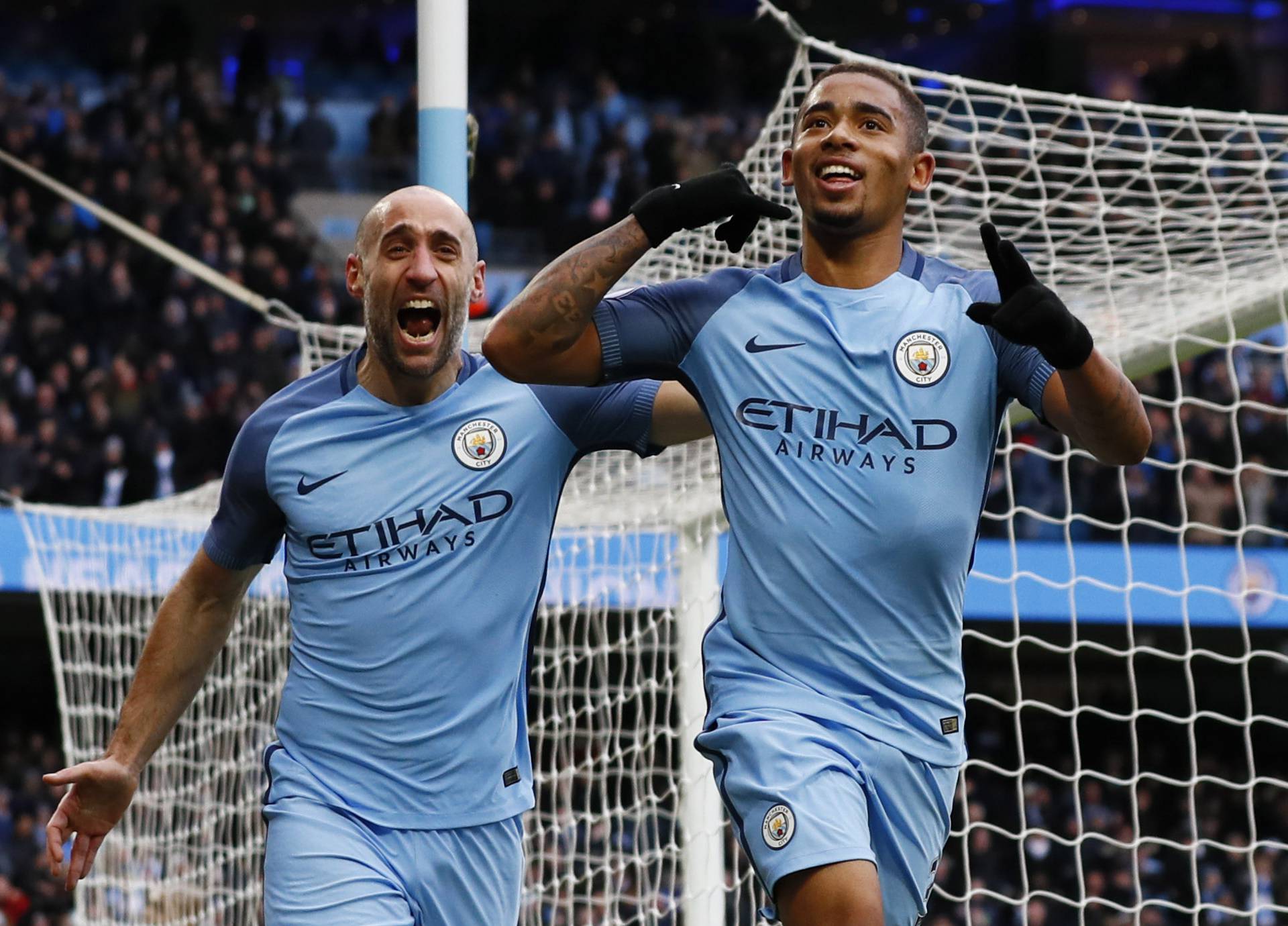 Manchester City's Gabriel Jesus celebrates scoring their second goal with Pablo Zabaleta