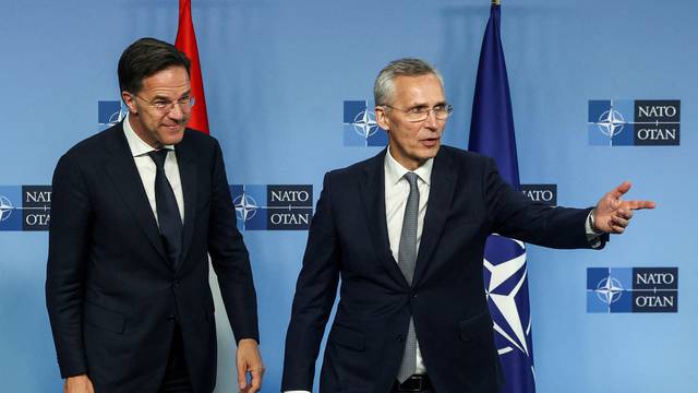 FILE PHOTO: Dutch Prime Minister Mark Rutte and NATO Secretary-General Jens Stoltenberg meet in Brussels