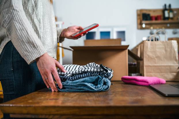 Business,Woman,Prepares,A,Parcel,For,Shipping,In,A,Cardboard