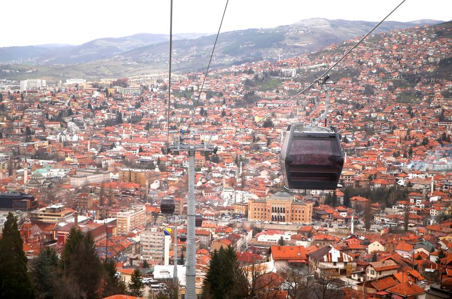 The Trebevic cable car is seen above the city of Sarajevo during a test drive following the restoration of the line after 26 years