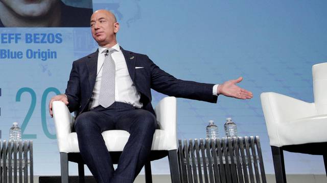 FILE PHOTO: Jeff Bezos, founder of Blue Origin and CEO of Amazon, speaks about the future plans of Blue Origin in Washington