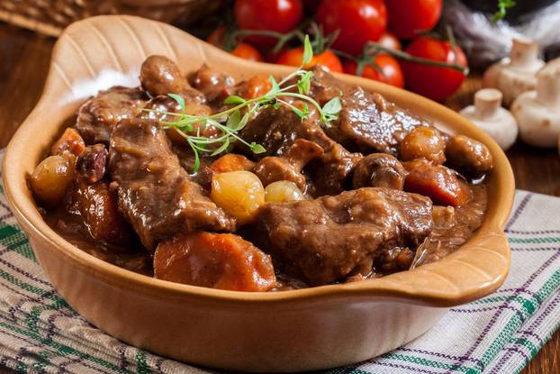 Beef Bourguignon stew served with baguette