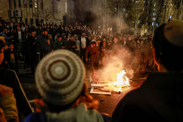 Israelis protest a ceasefire deal, in Jerusalem