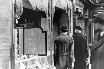 Germany: Shattered storefront of a Jewish-owned shop destroyed during Kristellnacht, Berlin, 1938