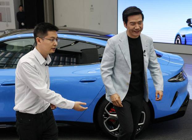 Chinese tech giant Xiaomi unveils new generation of SU7 electric vehicle, in Beijing