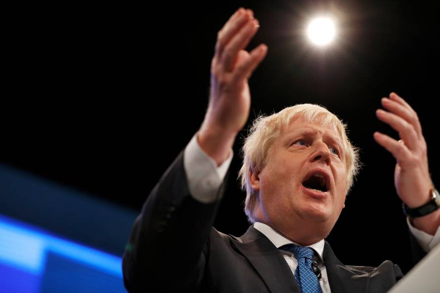 Britain's Foreign Secretary Boris Johnson addresses the Conservative Party conference in Manchester