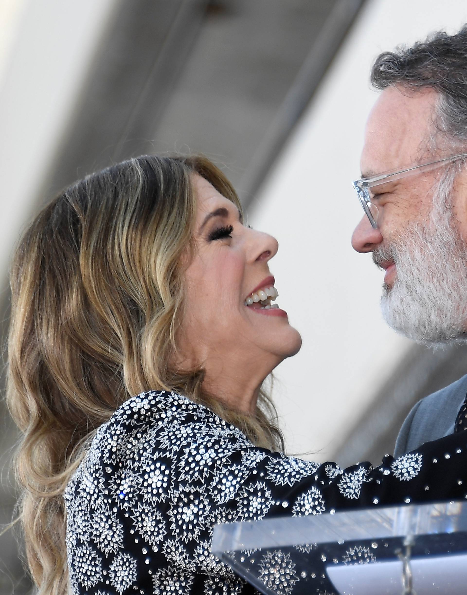 Actor Rita Wilson and husband Tom Hanks embrance during a ceremony honoring Wilson with a star on Hollywood's Walk of Fame in Los Angeles