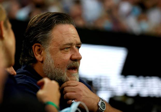 FILE PHOTO: Actor Russell Crowe in the stands watches the Australian Open