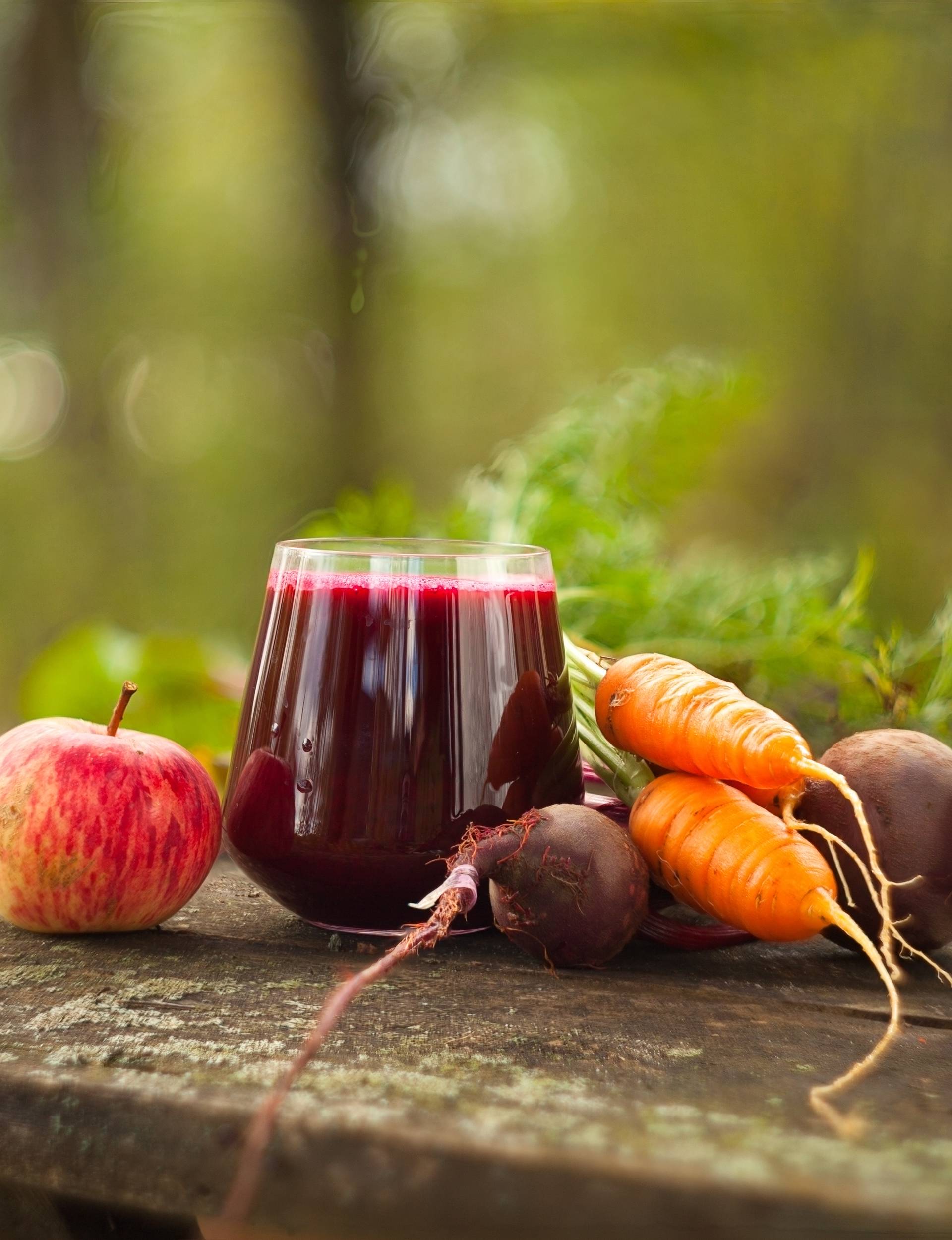 beet juice in glass on  table