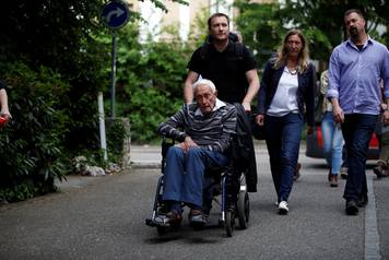 David Goodall, 104, arrives to hold a news conference a day before he intends to take his own life in assisted suicide, in Basel