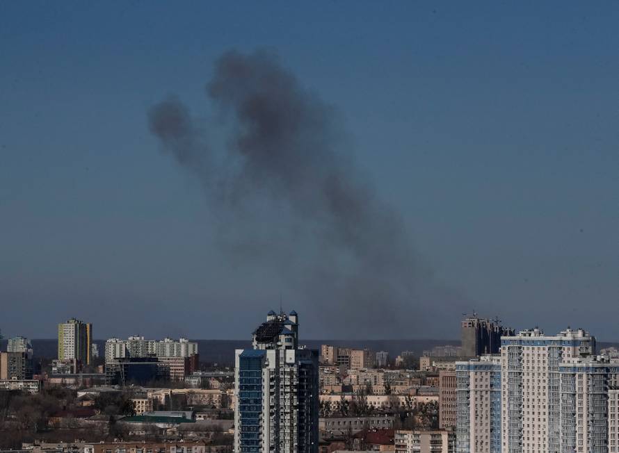 Smoke rises after shelling in Kyiv
