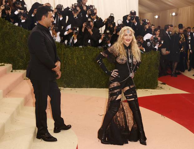 Singer Madonna arrives with designer Tisci at the Met Gala in New York