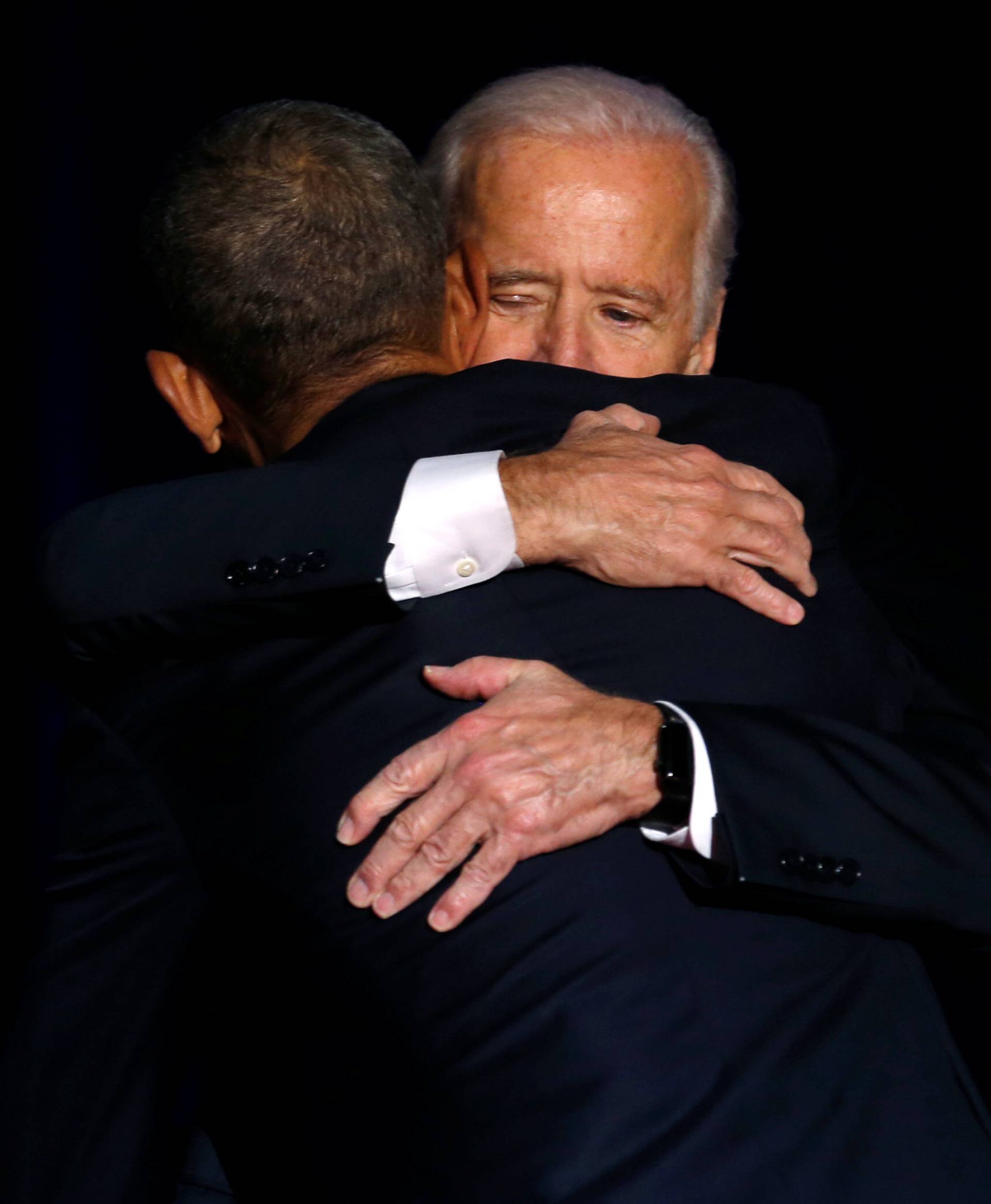 U.S. President Barack Obama is joined onstage by Vice President Joe Biden after his farewell address in Chicago
