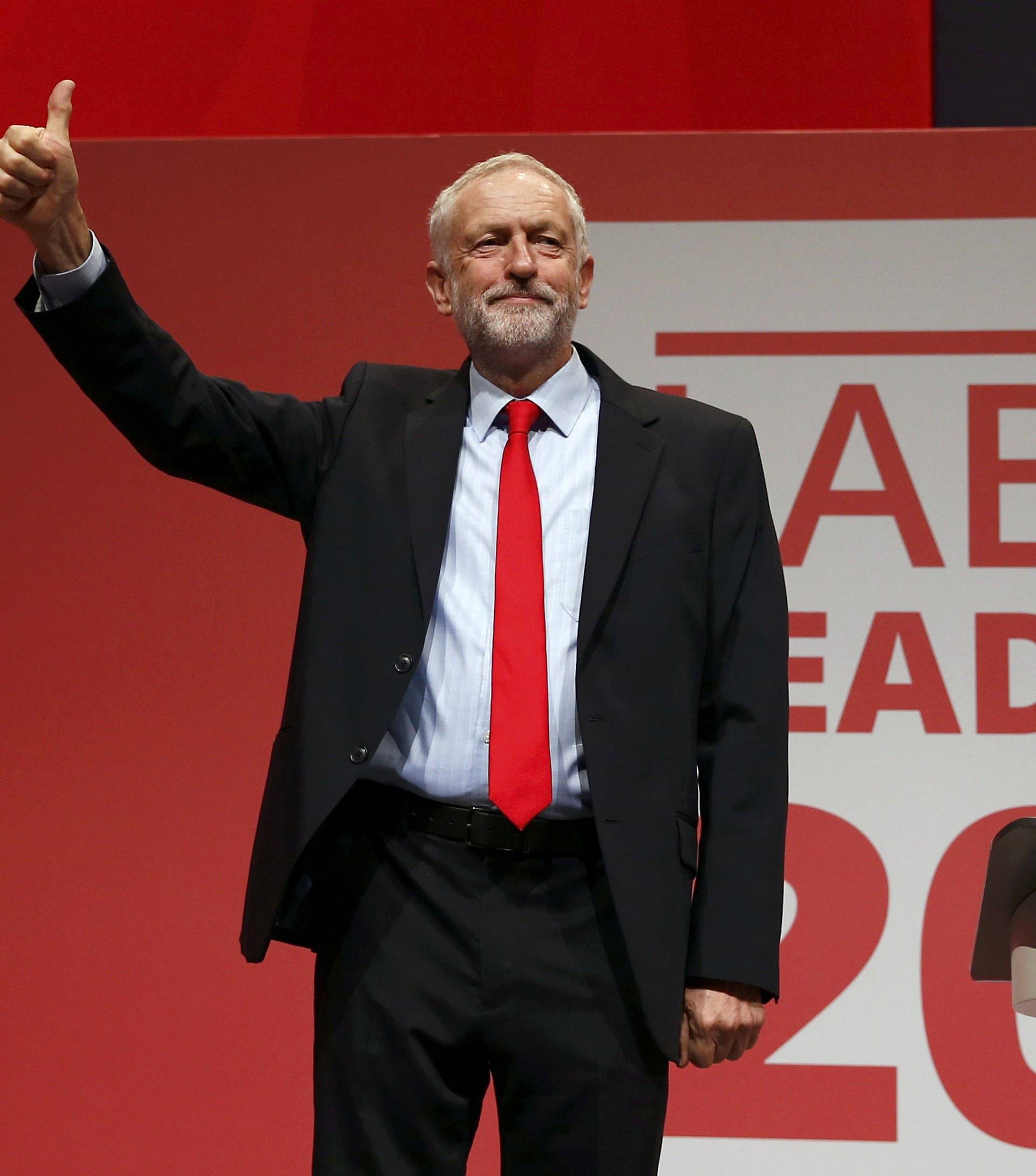 The leader of Britain's opposition Labour Party, Jeremy Corbyn, reacts after the announcement of his victory in the party's leadership election, in Liverpool