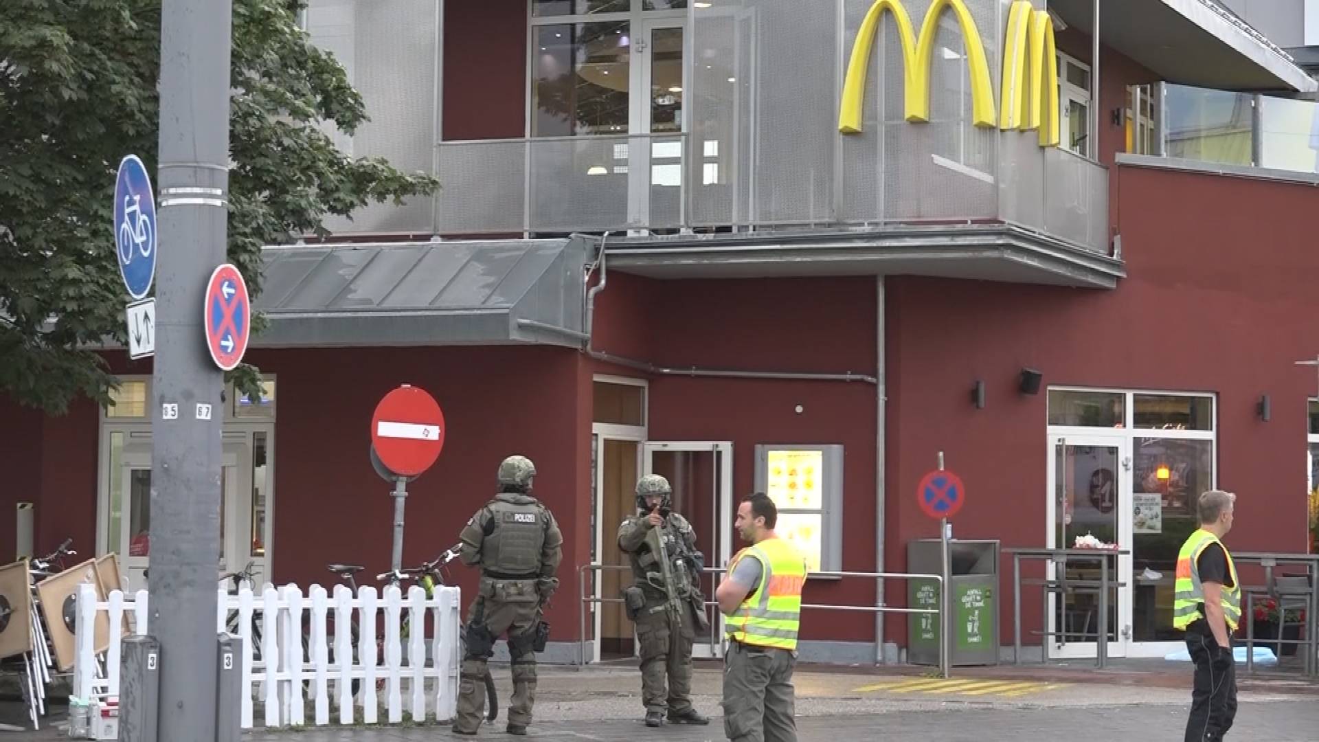 Screen grab shows special forces police officers standing guard following shooting rampage at shopping mall in Munich