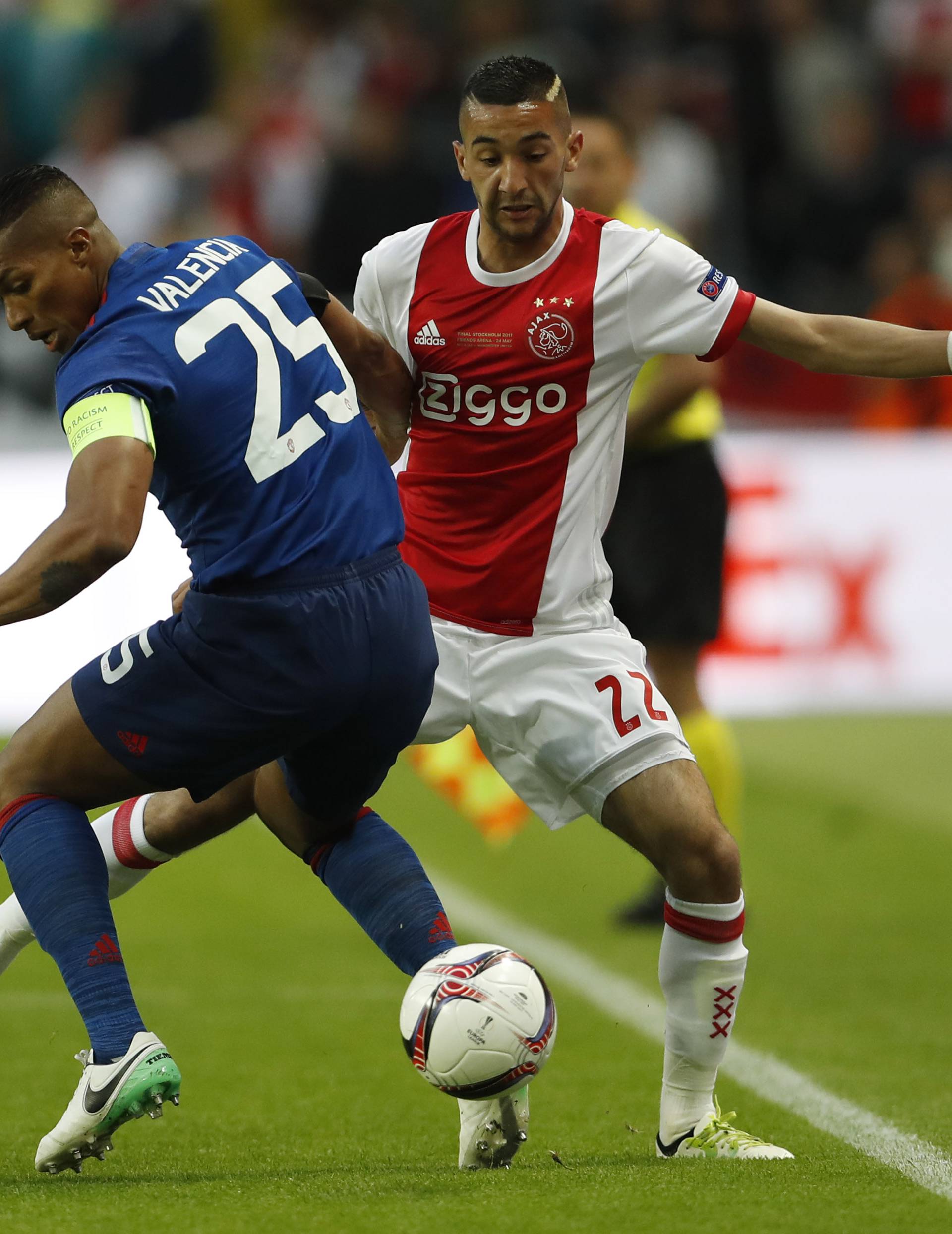 Ajax's Hakim Ziyech in action with Manchester United's Antonio Valencia