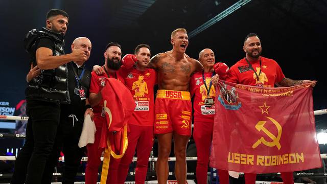Steve Robinson celebrates with the team after victory over Reece Barlow in their Heavyweight Contest at the Utilita Arena, Newcastle. Picture date: Saturday October 16, 2021.