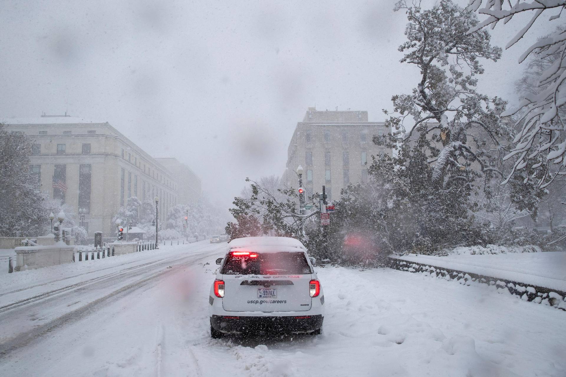 Snow falls during a winter storm on Capitol Hill in Washington