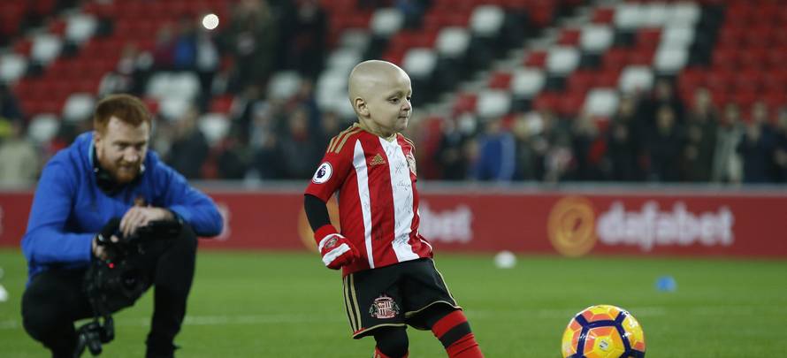 Sunderland mascot Bradley Lowery kicks a ball before the game