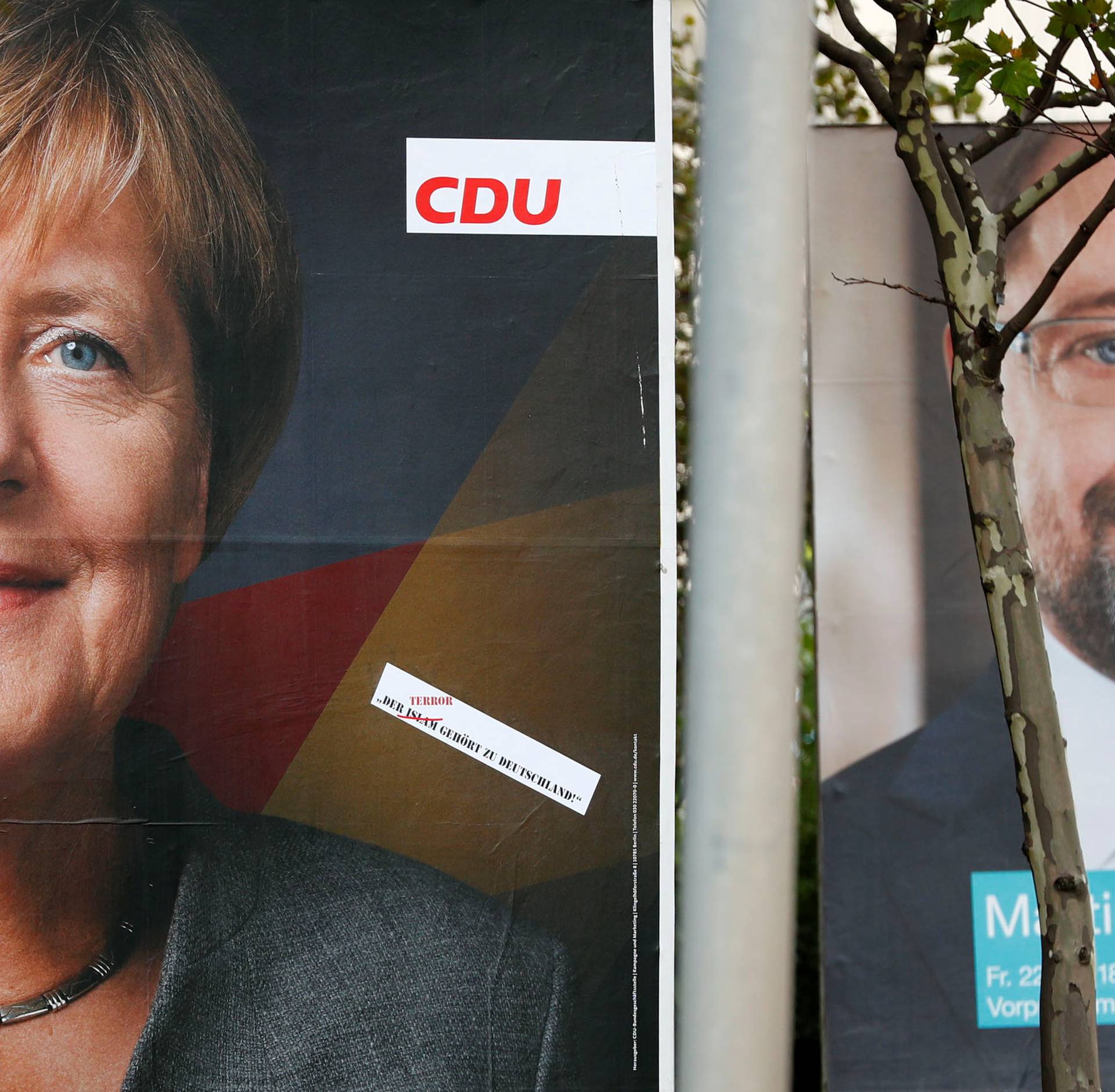 Election campaign posters of the CDU and SPD for the upcoming general elections are pictured in Berlin