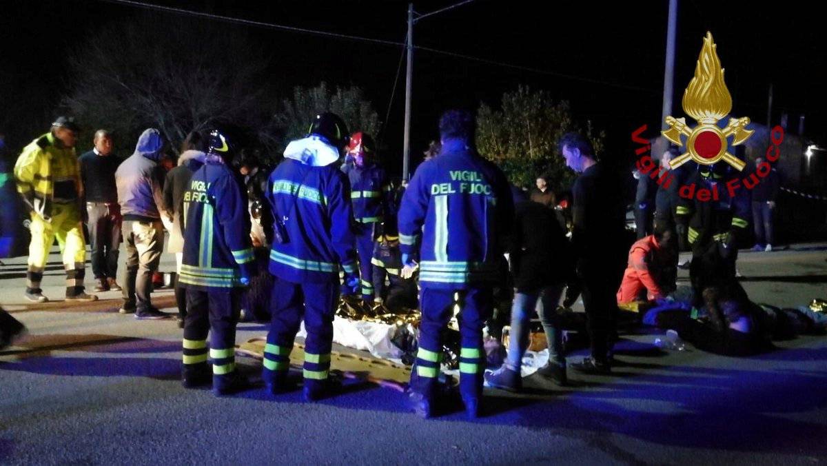 Emergency personnel attend to victims of a stampede at a nightclub in Corinaldo, near Ancona, Italy