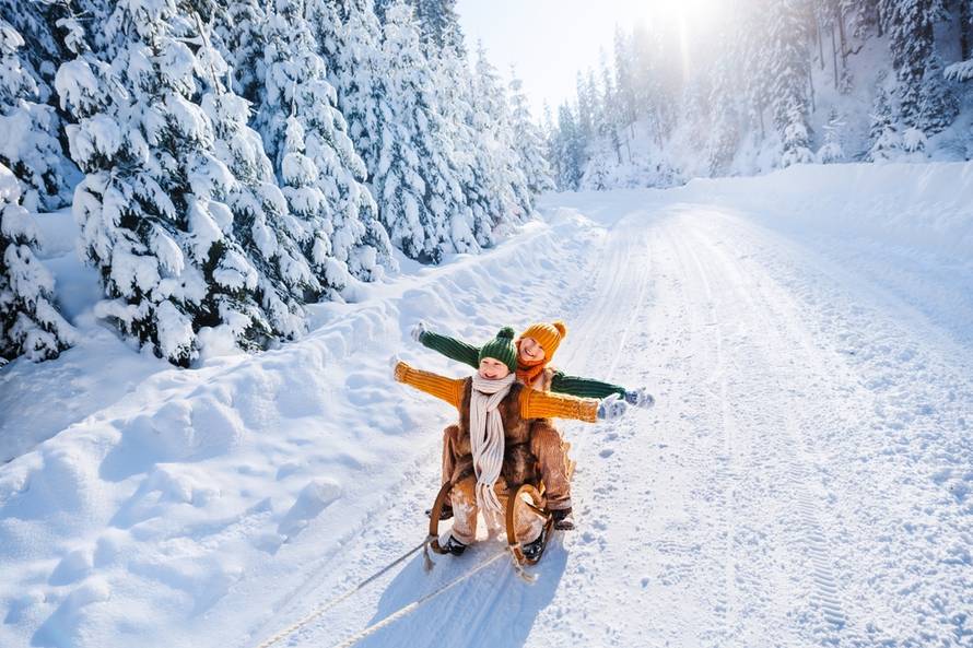 Happy,Funny,Children,Ride,Wooden,Retro,Sleds,On,Snowy,Road