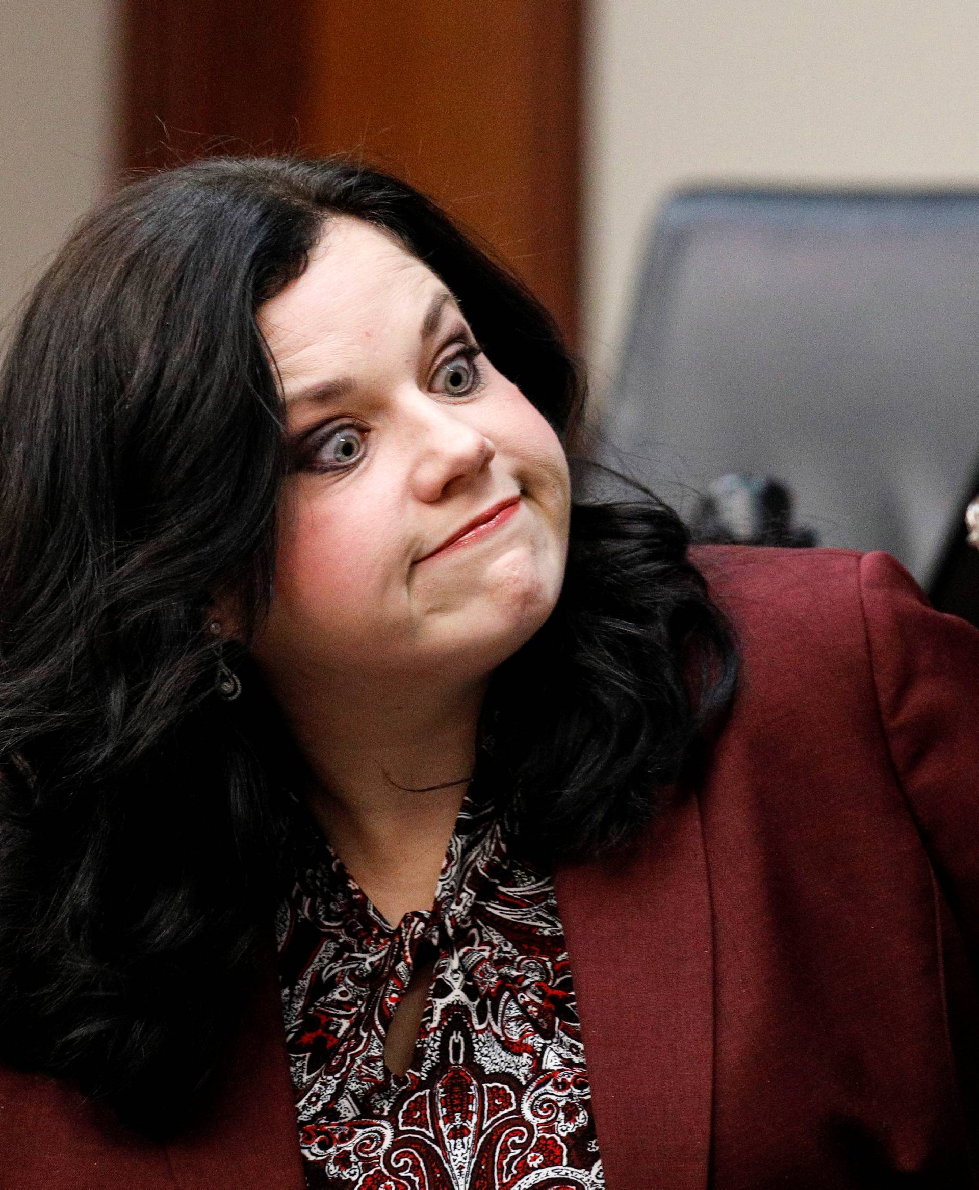 Attorney Shannon Smith smiles at her client Larry Nassar, a former team USA Gymnastics doctor who pleaded guilty in November 2017 to sexual assault charges, in the courtroom during his sentencing hearing in Lansing, Michigan