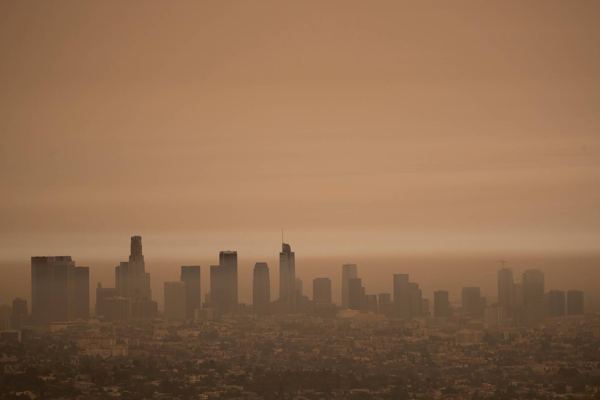 The downtown skyline is pictured amidst the smoke from the Bobcat fire in Los Angeles