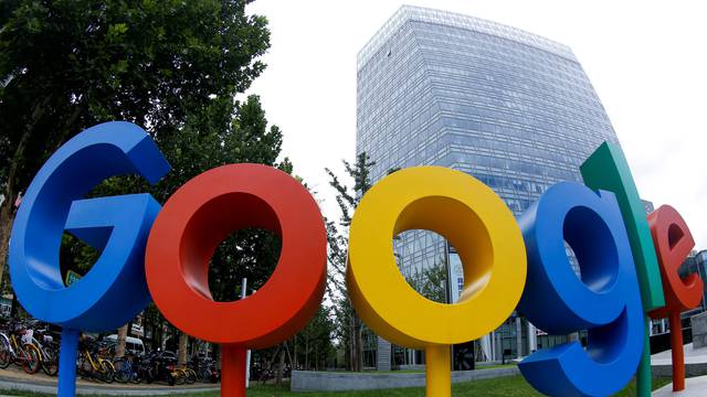 FILE PHOTO: The logo of Alphabet Inc's Google outside its office in Beijing