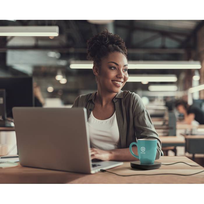 Portrait,Of,Charming,Young,Woman,Sitting,At,Table,With,Laptop