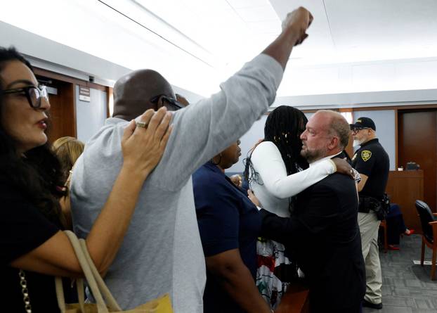Friends and family members of rapper Tupac Shakur line up to thank Chief Deputy District Attorney Marc DiGiacomo after a jury found Duane Davis guilty in the 1996 killing of Tupac Shakur