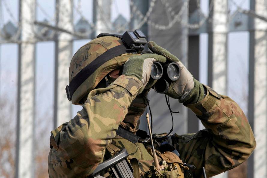 Polish Prime Minister Donald Tusk visits reinforced barrier at the Polish-Belarusian border