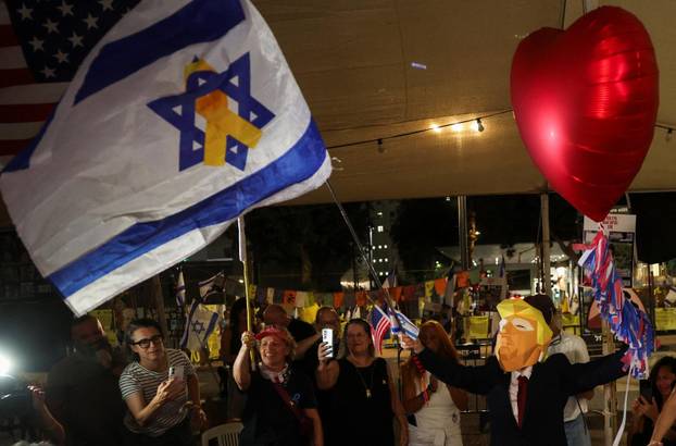Reactions after Trump announced that Israel and Hamas agreed on the first phase of a Gaza ceasefire, in Tel Aviv