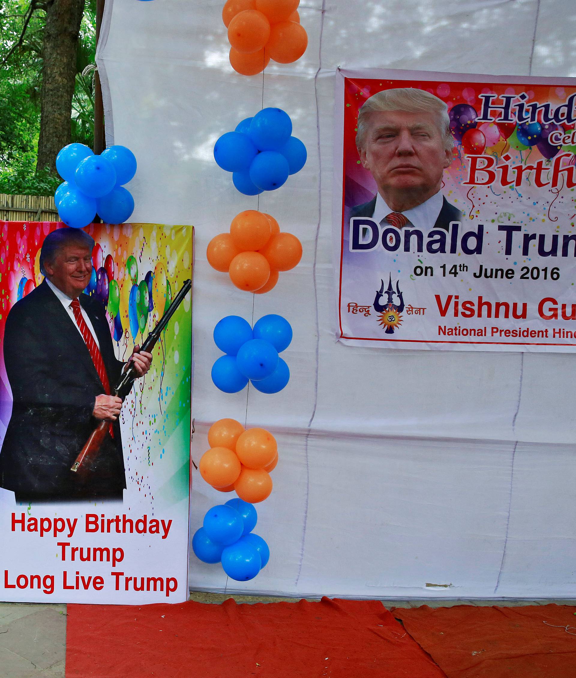 Members of Hindu Sena, a right wing Hindu group, celebrate U.S. Republican presidential candidate Trump's birthday in New Delhi