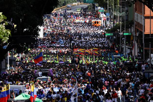 Government supporters participate in a womens march, in Caracas