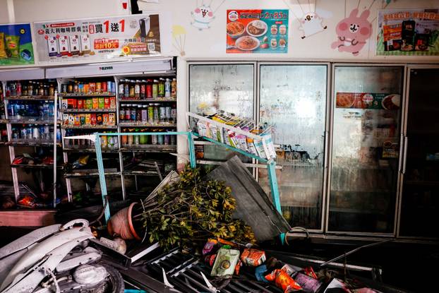 A damaged convenience store, after flooding brought by Super Typhoon Ragasa in Hualien
