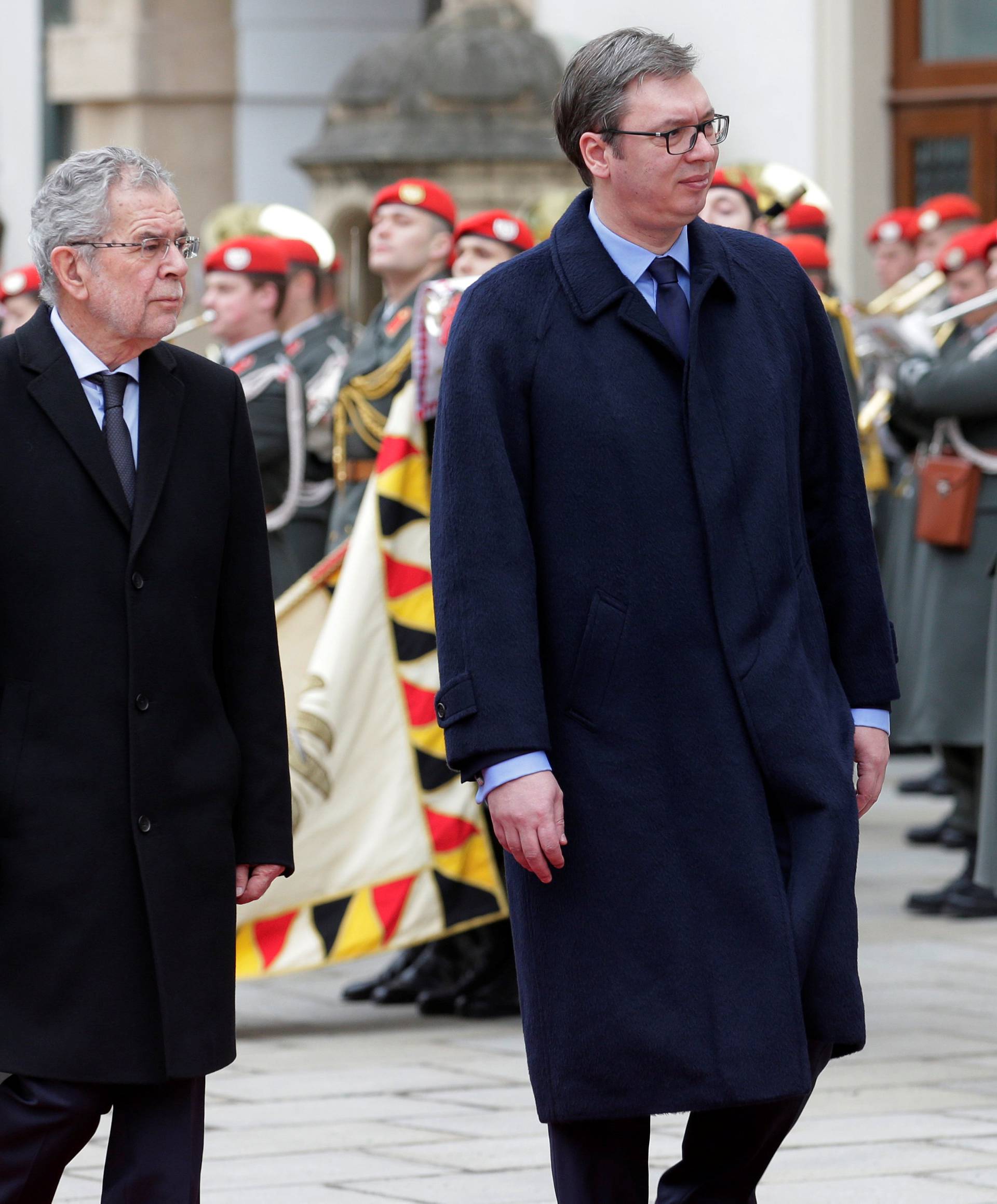 Austria's President Van der Bellen and Serbia's President Vucic review the honour guard in Vienna