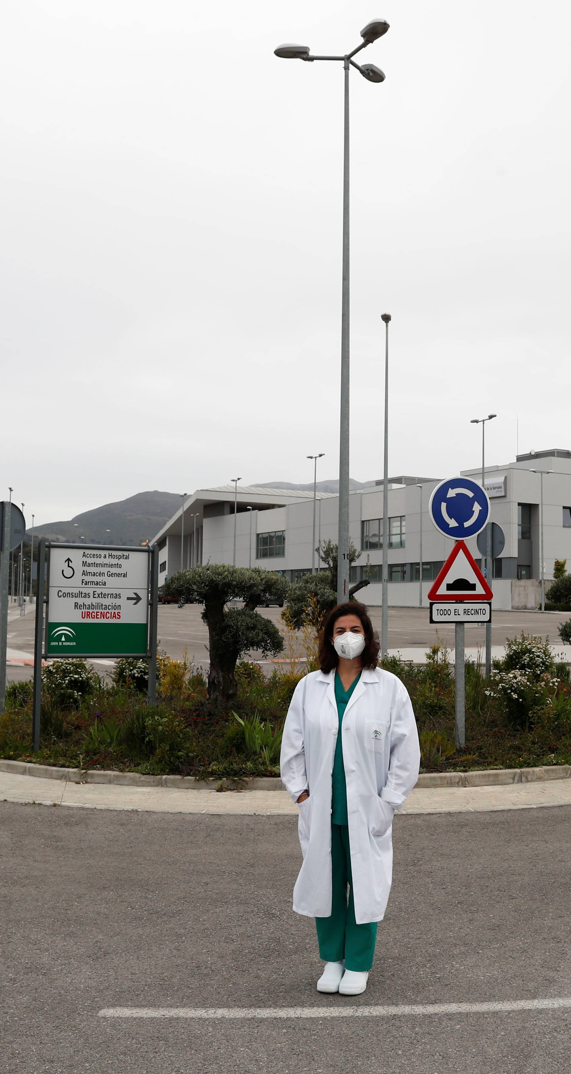 Maria Jose Garcia, an intensive care unit nurse, poses outside her workplace, a hospital, amid the coronavirus disease (COVID-19) outbreak, in Ronda