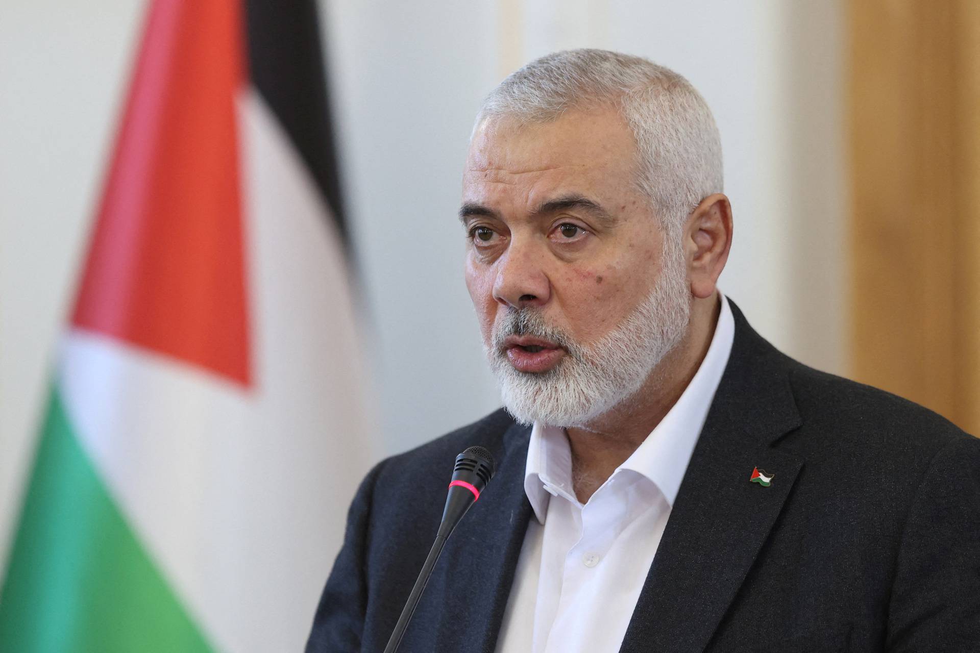 FILE PHOTO: Palestinian group Hamas' top leader, Ismail Haniyeh and Iran's Foreign Minister Hossein Amir Abdollahian attend a press conference in Tehran