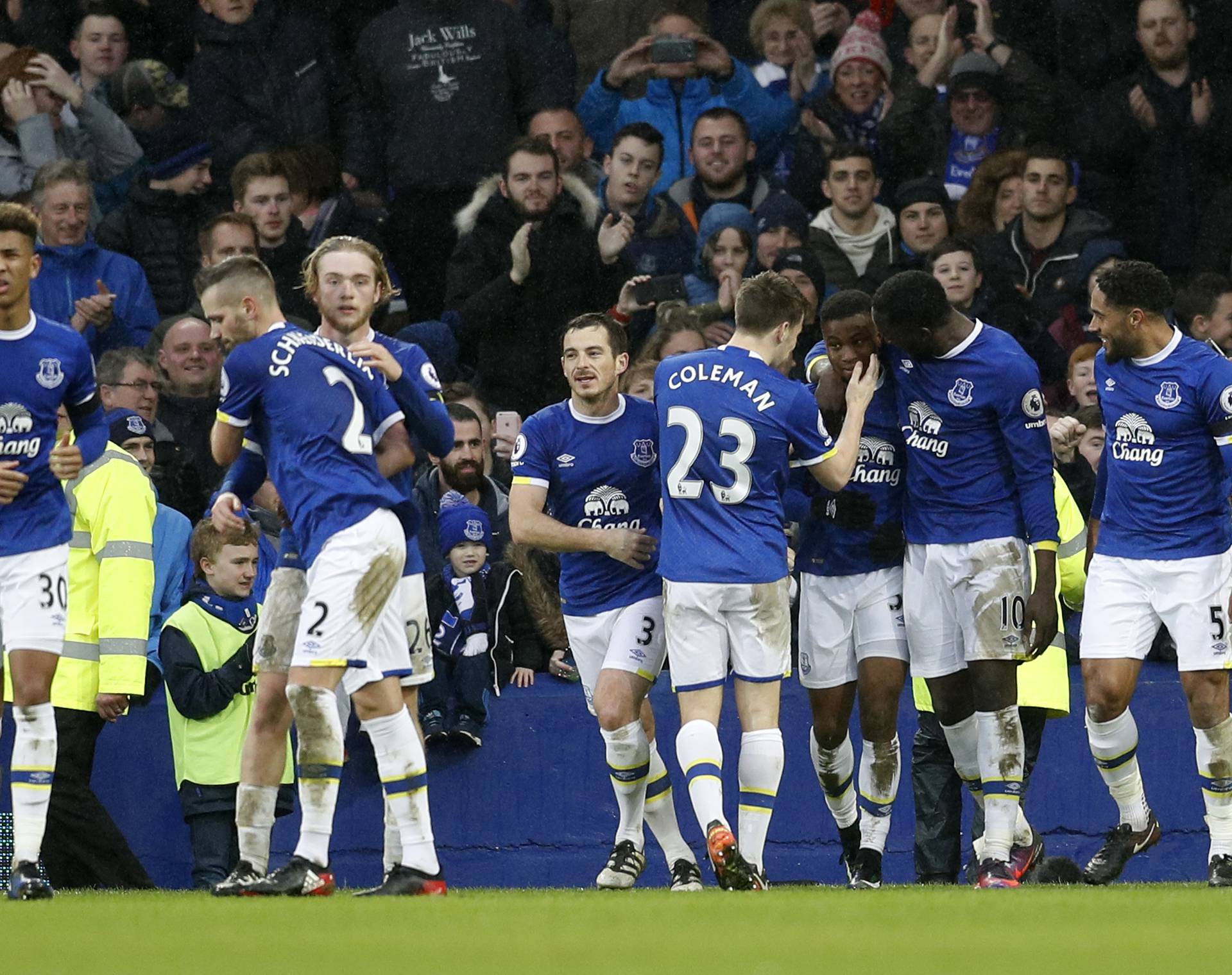 Everton's Ademola Lookman celebrates scoring their fourth goal with teammates