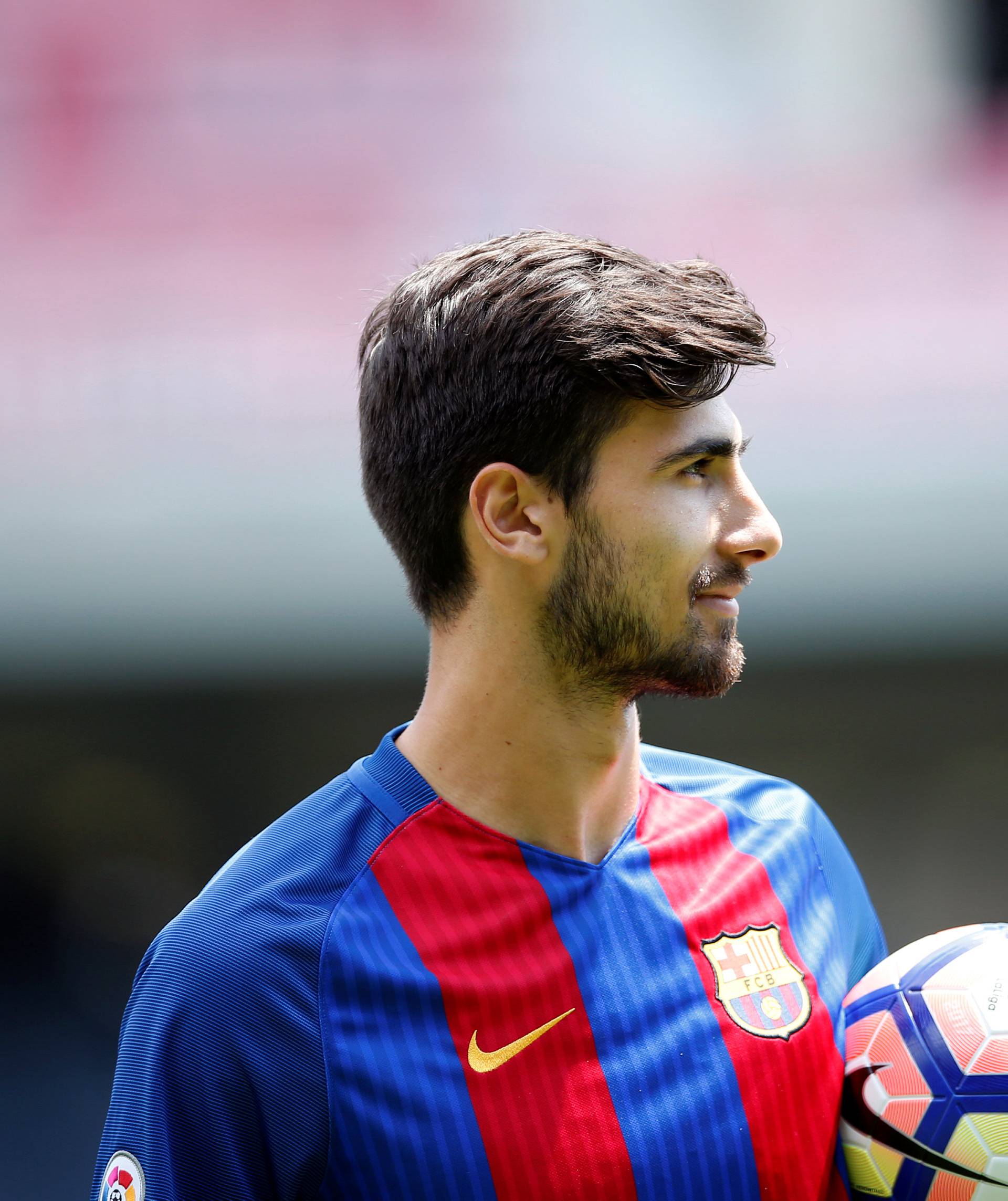 FC Barcelona's newly signed soccer player Andre Gomes poses during his presentation at Miniestadi stadium in Barcelona