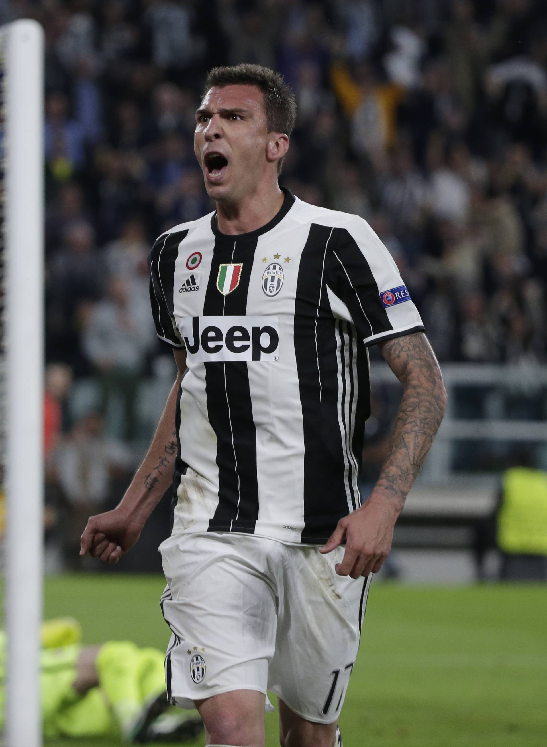 Juventus' Mario Mandzukic celebrates scoring their first goal