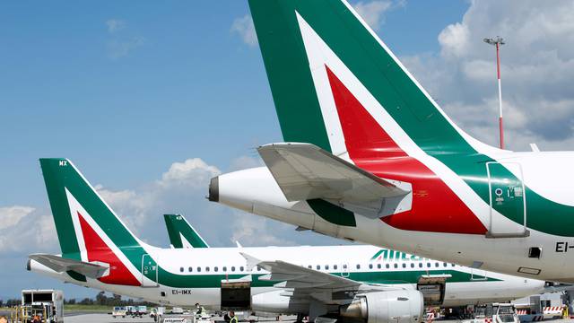 FILE PHOTO: Alitalia planes are seen on the tarmac at Fiumicino International Airport in Rome