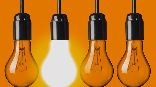 Light,Bulbs,On,Orange,Background