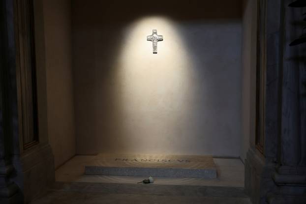 A flower is placed at tomb of the late Pope Francis in the Papal Basilica of Saint Mary Major (Santa Maria Maggiore), in Rome