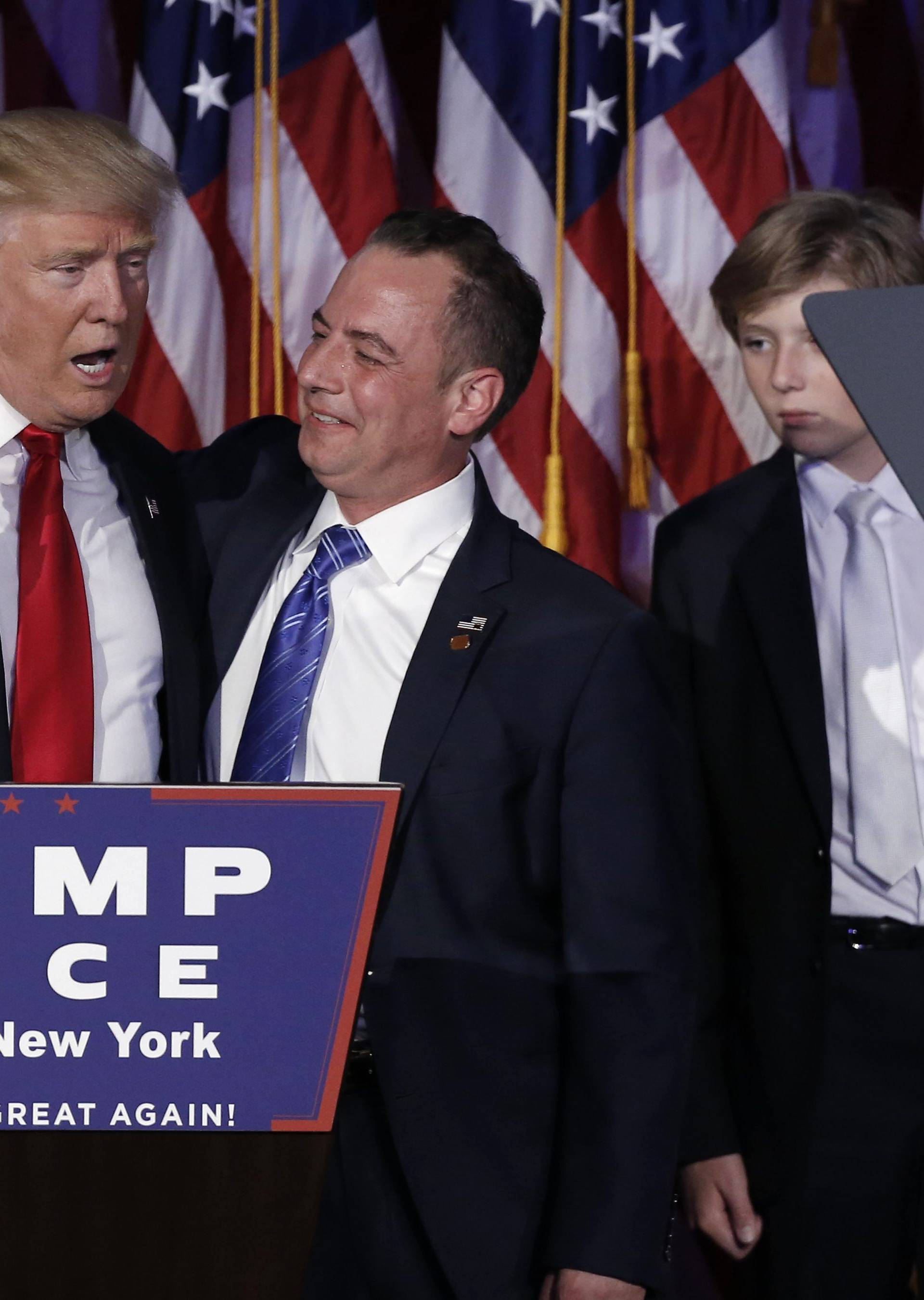 Donald Trump and Reince Priebus address supporters during his election night rally in New York